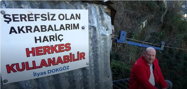 SÜRMENELİ İLYAS DOKGÖZ.. TELEFERİK SORUNUNU BU TABELA İLE ÇÖZDÜ